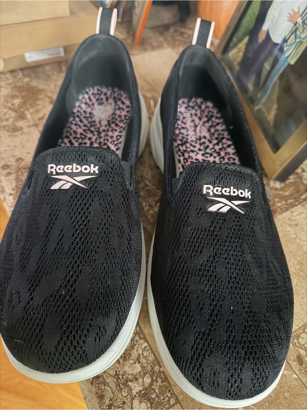 Reebok Women Slip-On Sneakers in Black with Pink Accents
